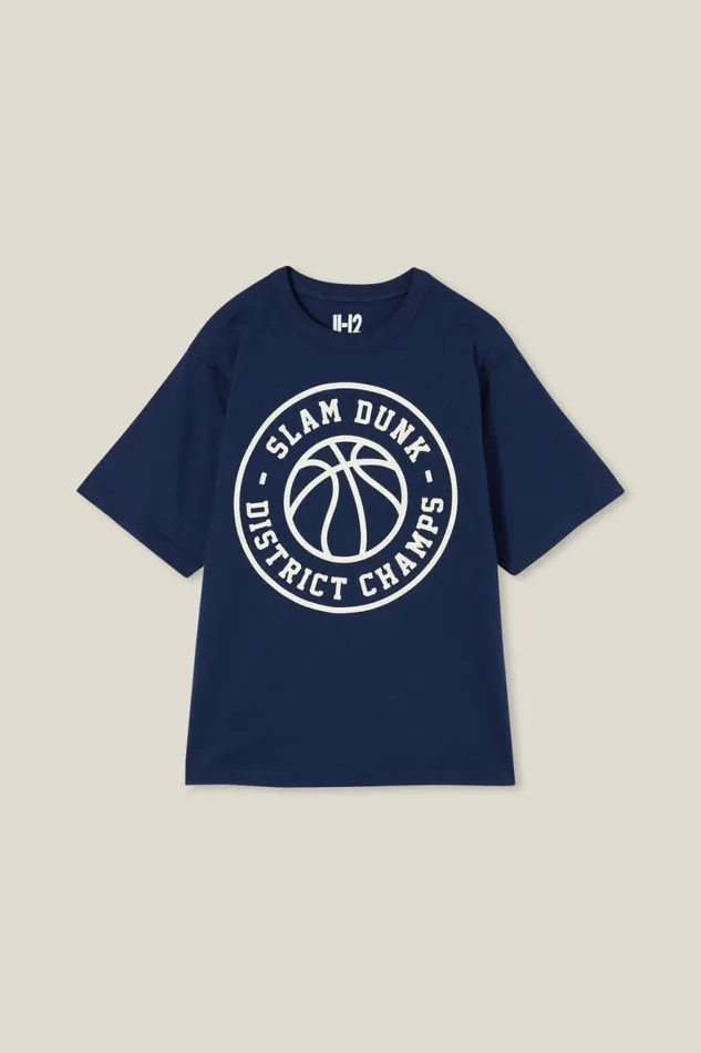 Jono Short Sleeve Print Tee In The Navyslam Dunk District Champs BoysGirls Cotton On Tops and TShirts Jono Short Sleeve Print Tee In The Navyslam Dunk District Champs BoysGirls Cotton On Tops and TShirts