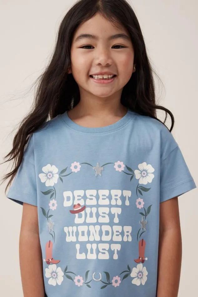 Poppy Short Sleeve Print Tee Dusty Bluewonderlust Girls Cotton On Tops and TShirts Poppy Short Sleeve Print Tee Dusty Bluewonderlust Girls Cotton On Tops and TShirts