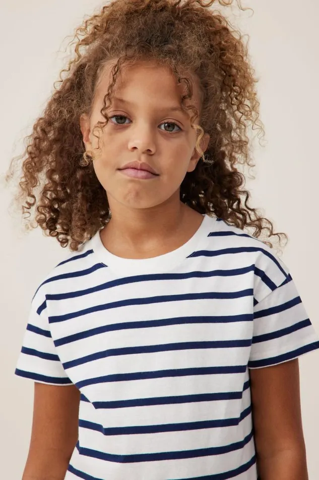 Poppy Short Sleeve Print Tee In The Navyvanilla Stripe Girls Cotton On Tops and TShirts Poppy Short Sleeve Print Tee In The Navyvanilla Stripe Girls Cotton On Tops and TShirts